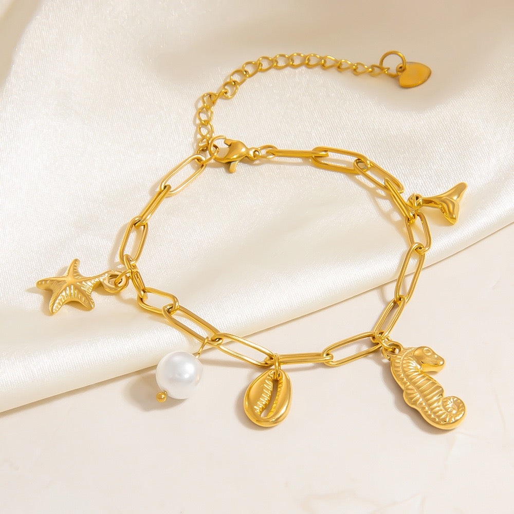 Seahorse charm shell bracelet