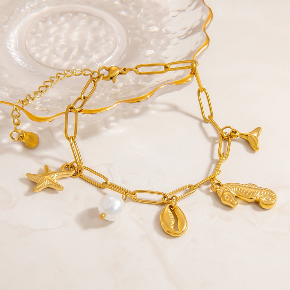Seahorse charm shell bracelet