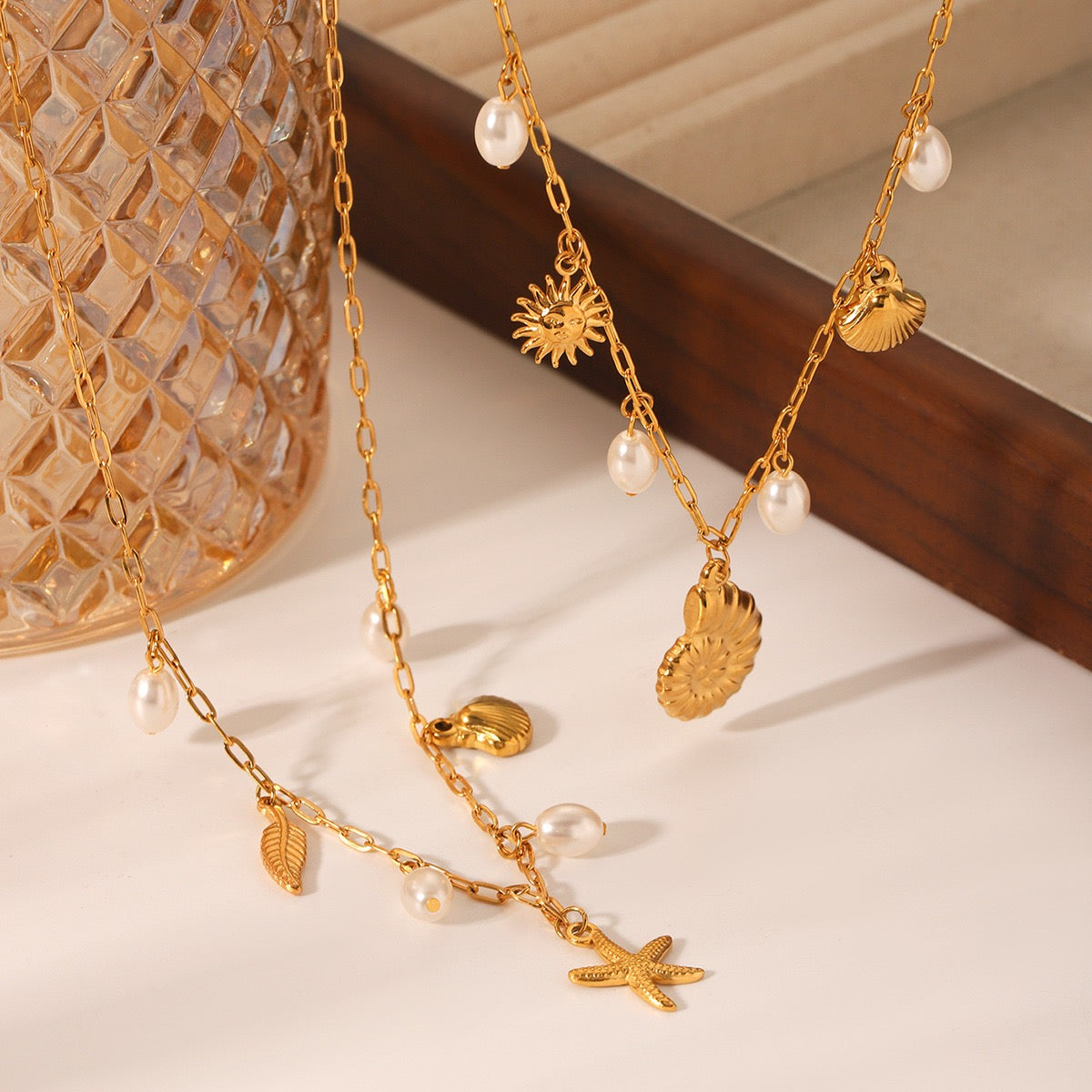 Pearly shell charm necklaces