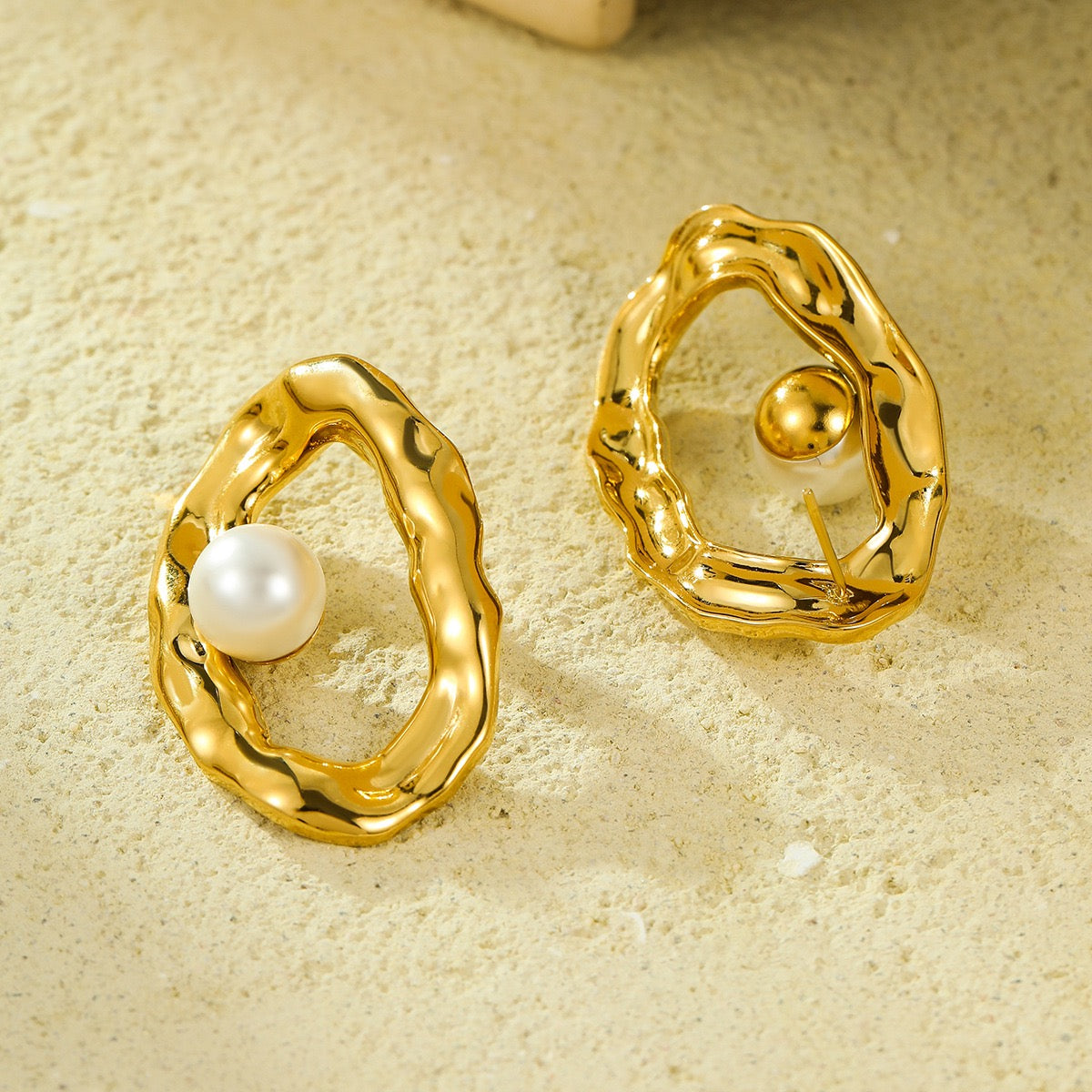 Pearly statement oval earrings