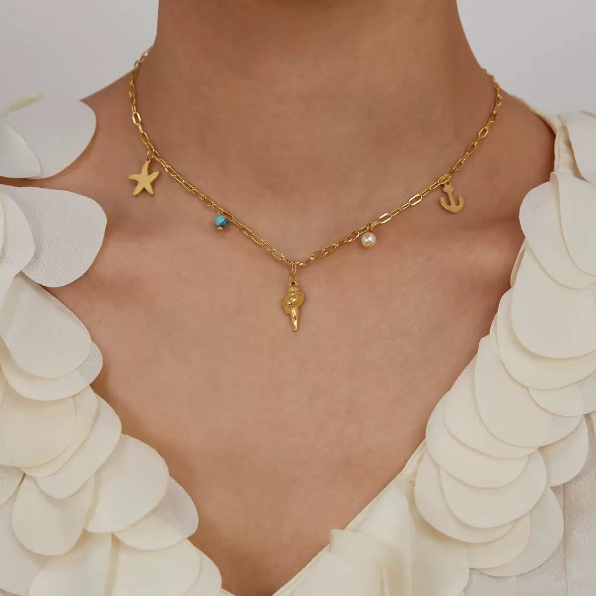 Dainty anchor shell charm necklace