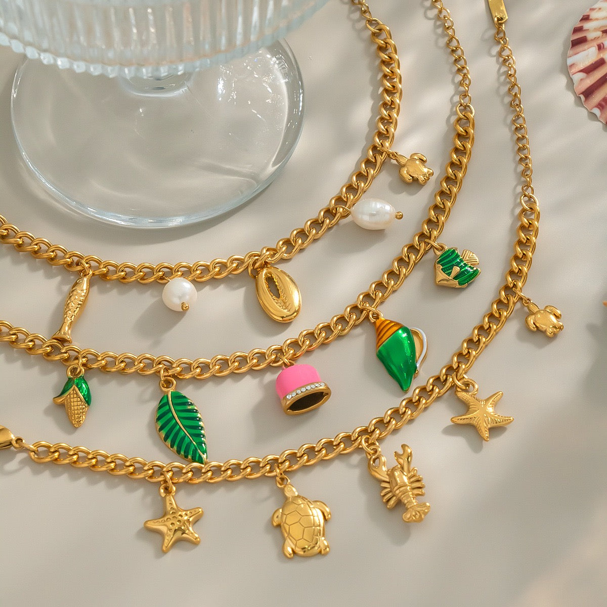 Ocean swirl charm necklaces