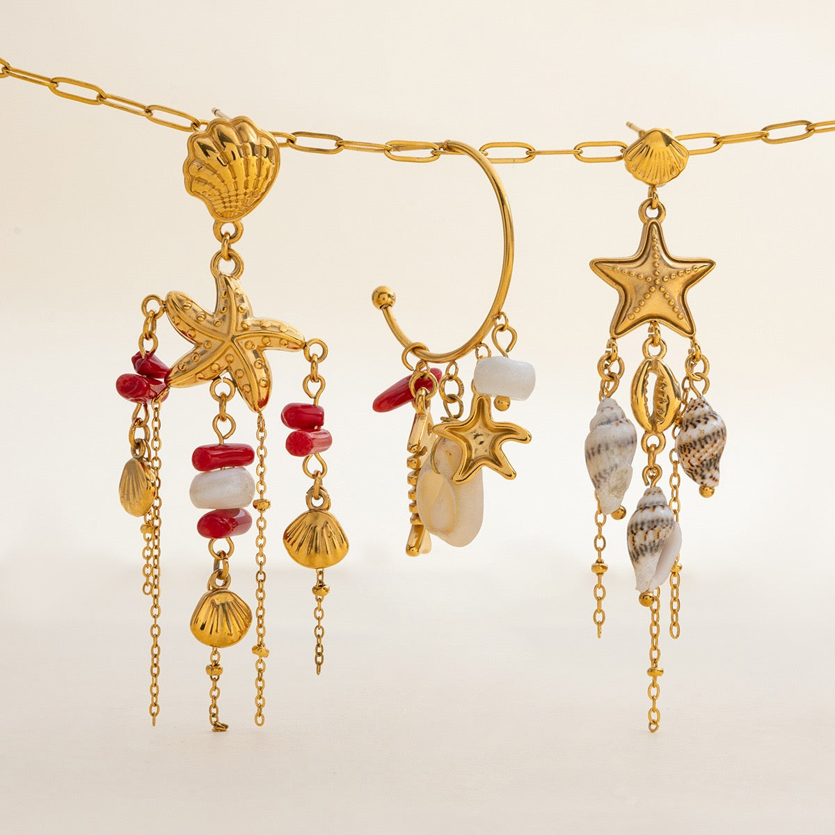 Dangling coral fish earrings