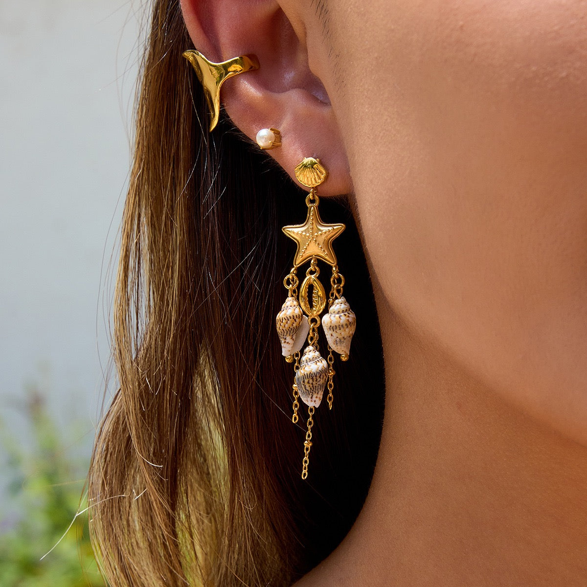 Dangling coral fish earrings