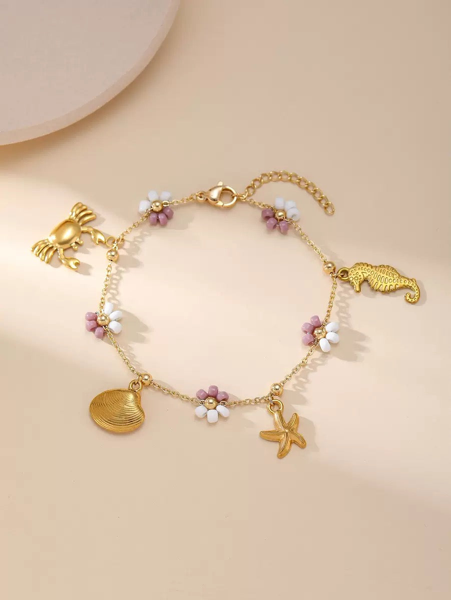 Purple flower charm bracelet