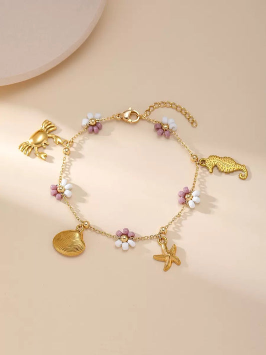 Purple flower charm bracelet