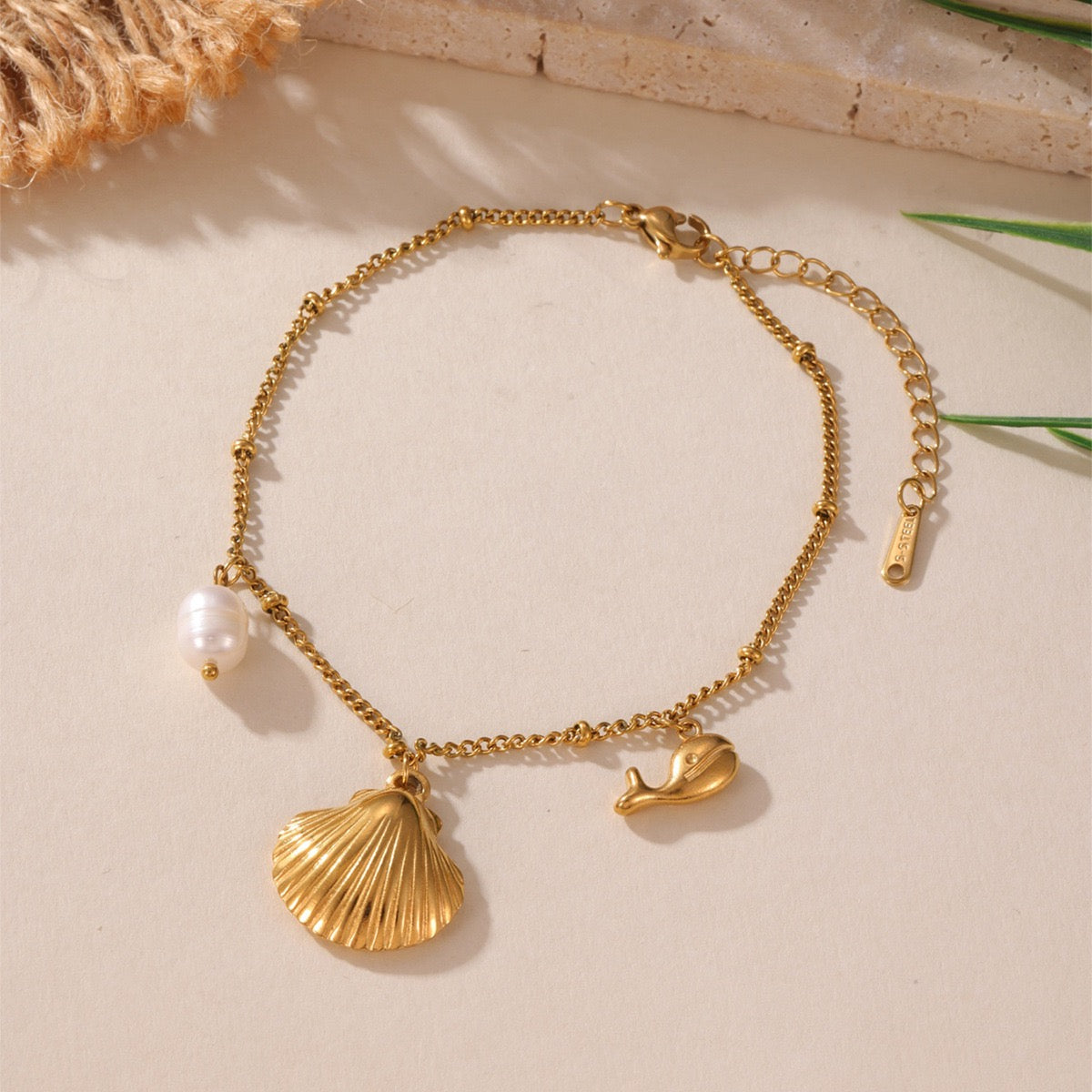 Shell dolphin charm anklet