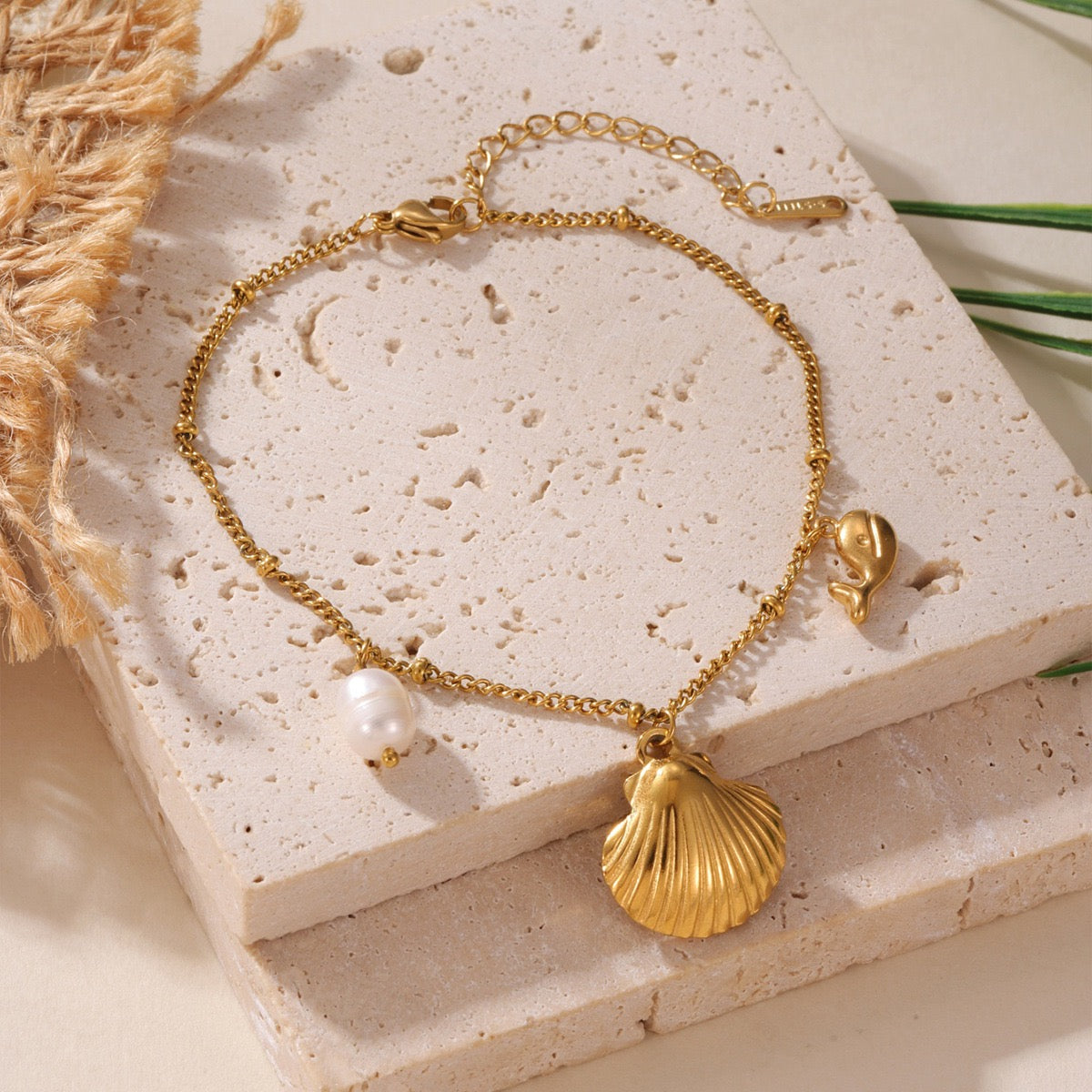 Shell dolphin charm anklet